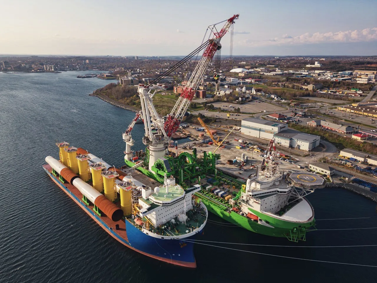 Heavy-lift ships with a crane in the harbour